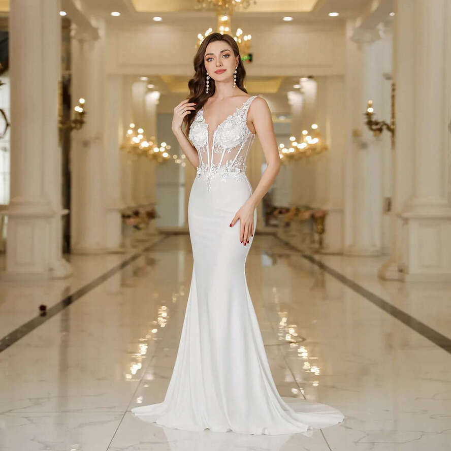 Sexy Backless Mermaid Wedding Dresses Deep V Neck Appliques Ivory Bridal Gowns Sweep Train Robes Under