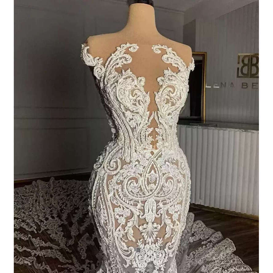 Gorgeous Lace Applique Wedding Dresses Illusion Bridal Gown Chapel Train Custom Made Jewel Neck Sleeveless African Plus Size Dubai Vestido De Novia 40