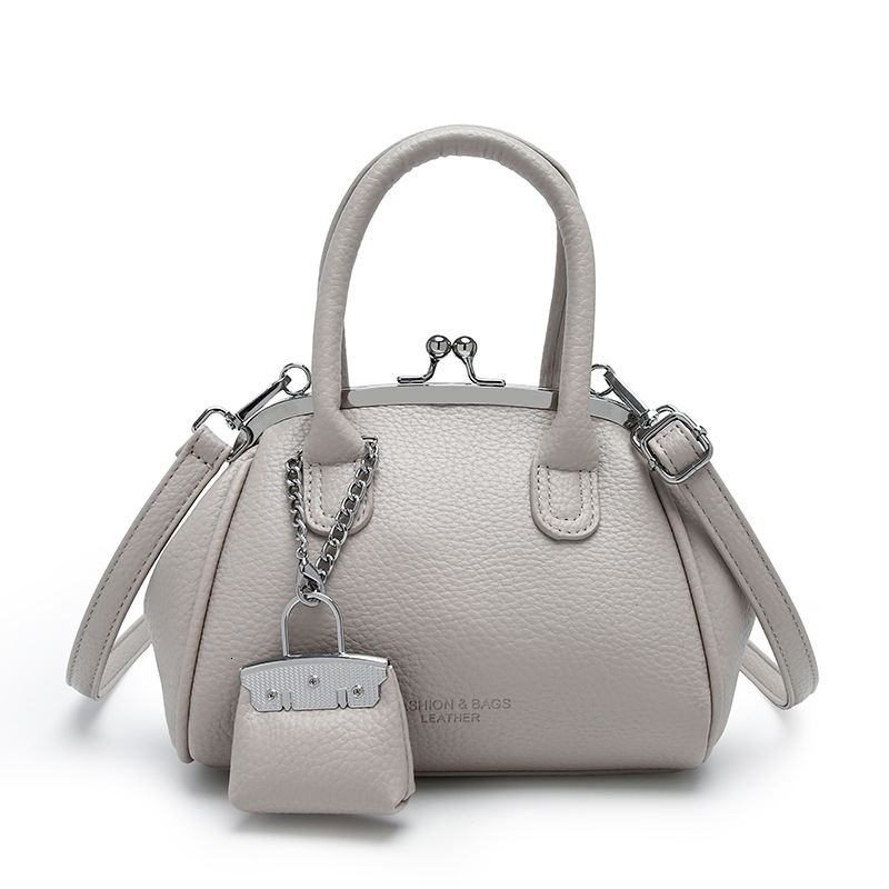 Bag Women's Versatile Crossbody Bag, Niche Texture Handbag, New Spring And Summer Elegant Hand-Held Clip Bag designer handbags women