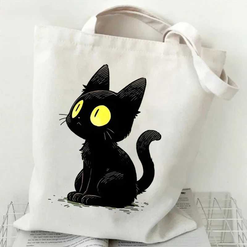 Canvas handbag anime black printed shopping bag womens graphic casual and fAshionable teenage handbag cartoon side bag Z250224