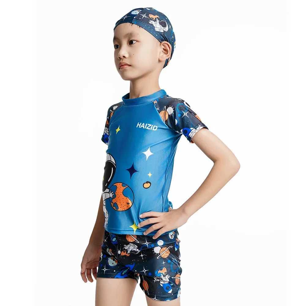 2025 Childrens New Swimsuit Cartoon Pattern Childrens Swimwear Boys Split Design Suitable Swimming Suit Beachwear with Hat X250224