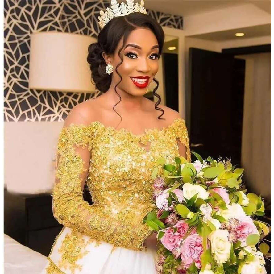 New African A E Wedding Dresses Off Shoulder Gold Lace Applique Beads Illusion Long Sleeves Backless Court Train Bridal Gowns