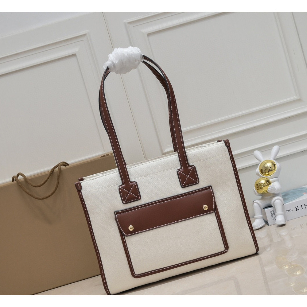 Design Aesthetics New Genuine Leather Women's Bag Design Sense Canvas Handheld Crossbody Bag European and American Style Tote Bag Niche Trendy Br