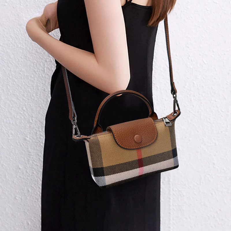 The New Women's Designer Shoulder Crossbody Bag Is Made Of High-quality Canvas Cowhide And Features A High-end And Elegant Checkered Pattern Hand
