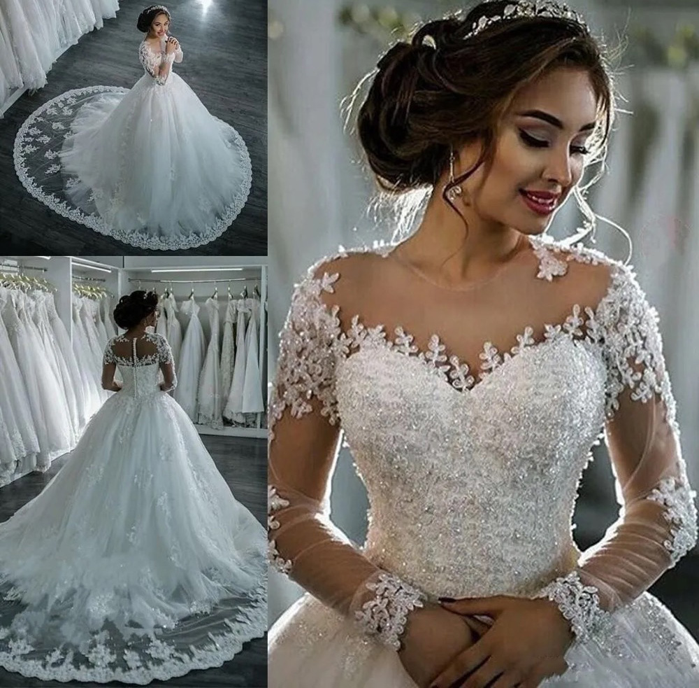 A-line Wedding Dresses Dubai Long Sleeves Gowns Sheer Crew Neck Lace Appliques Beaded Vestios De Novia Bridal Gowns with Buttons