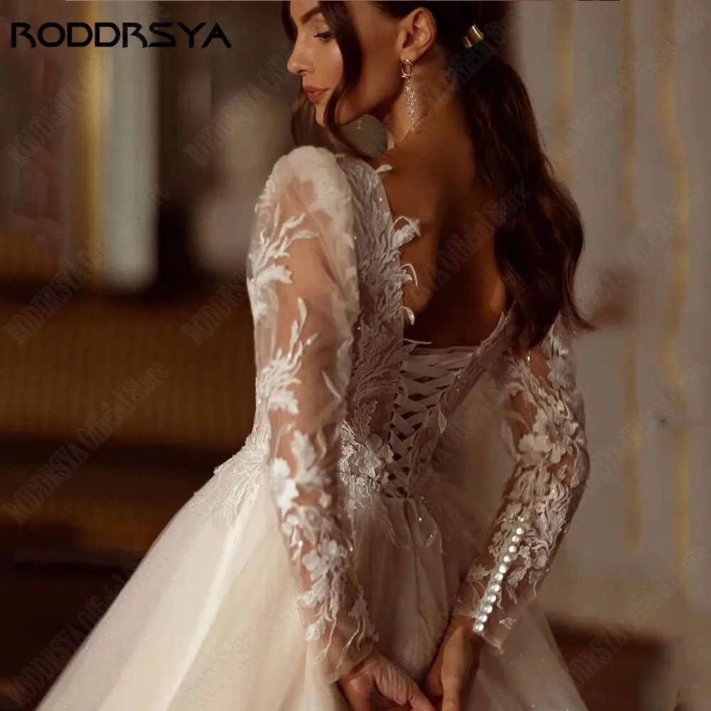 RODDRSYA Shiny Long Sleeves Wedding Dress ALine Lace Up Bridal Gowns Applique Beading VNeck Customized 250224