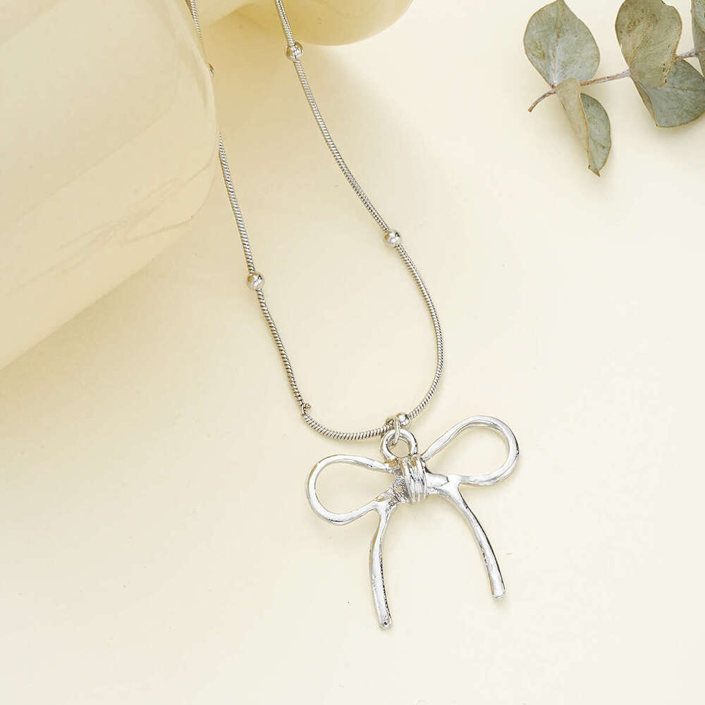 New light Instagram niche women's bow with high-end feel creative summer wear matching necklace