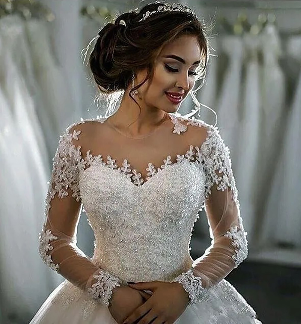 A-line Wedding Dresses Dubai Long Sleeves Gowns Sheer Crew Neck Lace Appliques Beaded Vestios De Novia Bridal Gowns with Buttons