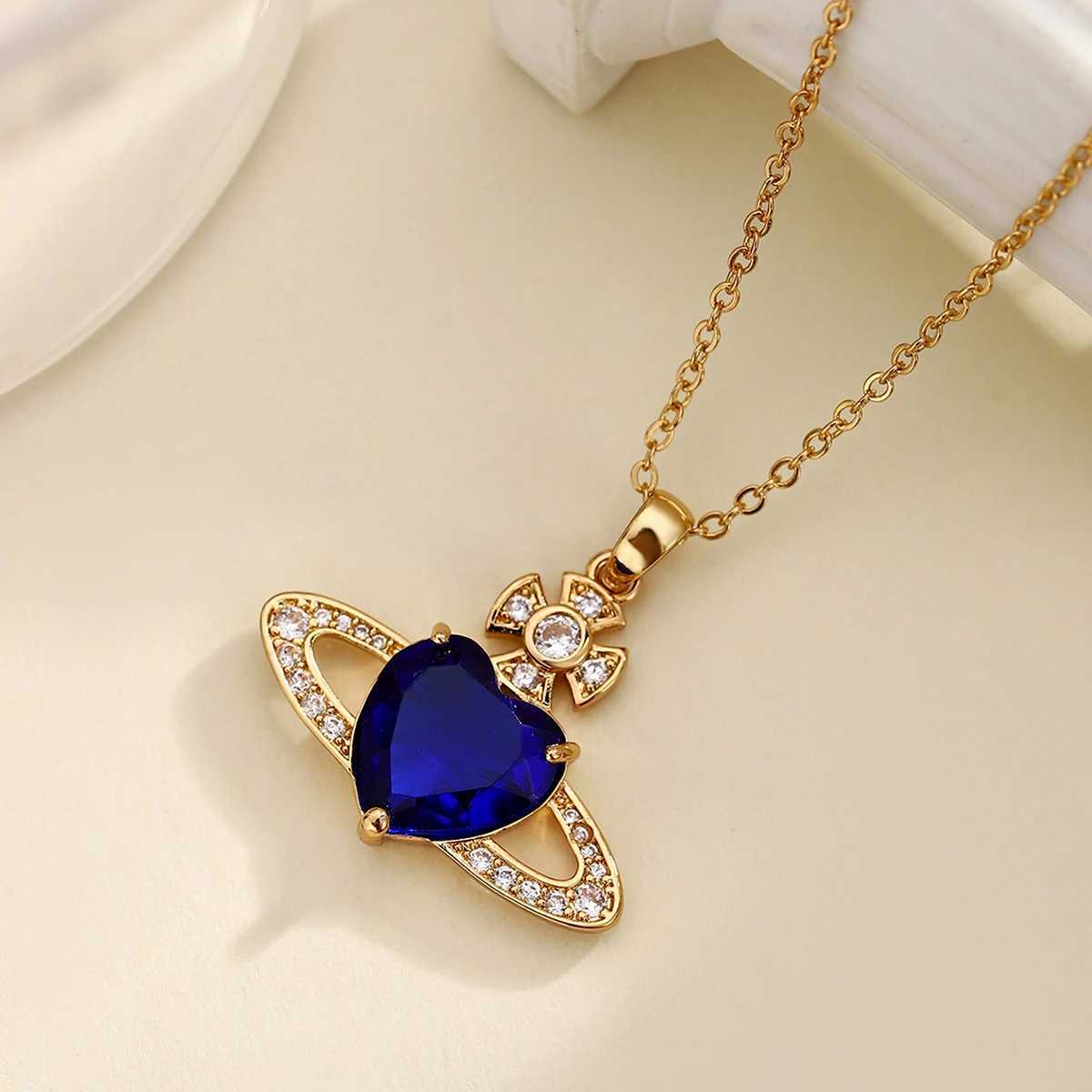 Pendant Necklaces Retro Saturn high-end fashionable copper inlaid synthetic zircon royal blue heart necklace J25021755EQ