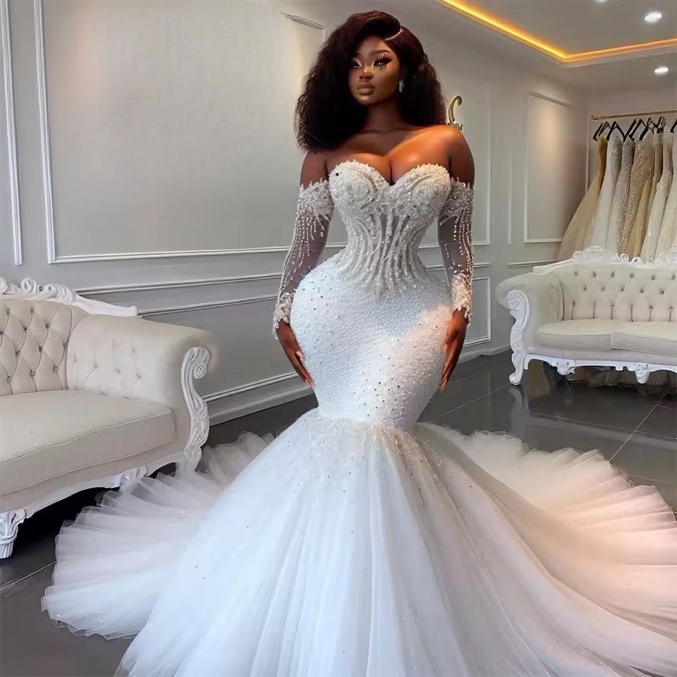 2025 White Bead Crystal Wedding Dresses Sweetheart Long Sleeve Bride Mermaid Special Ocn Gown Customized