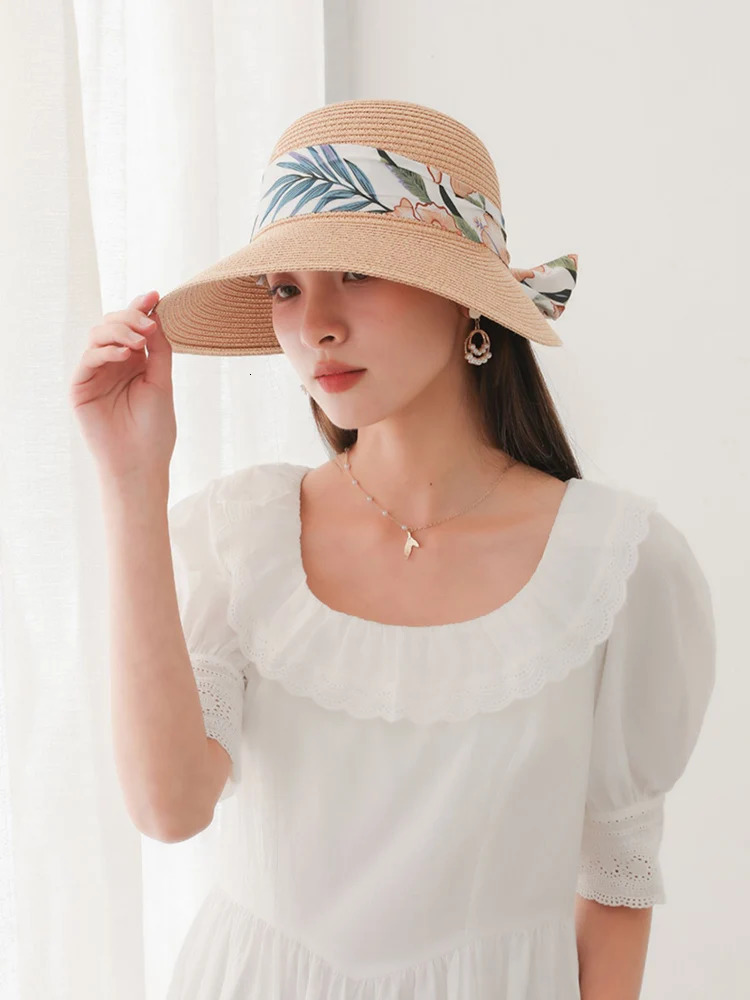 High selling womens summer tourism vacation sunshade and sunscreen hats leaf ribbon leisure beach large brim sun hat 250218