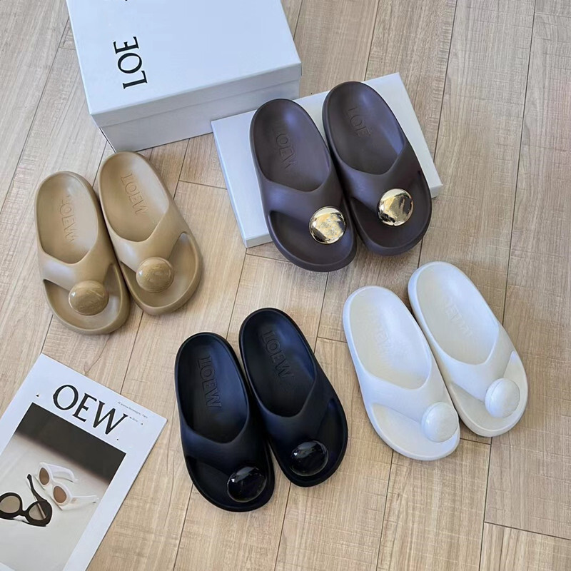 Comfortable flat bottomed vacation beach flip flops for summer 2024, with thick bottom and a casual toe, worn outside
