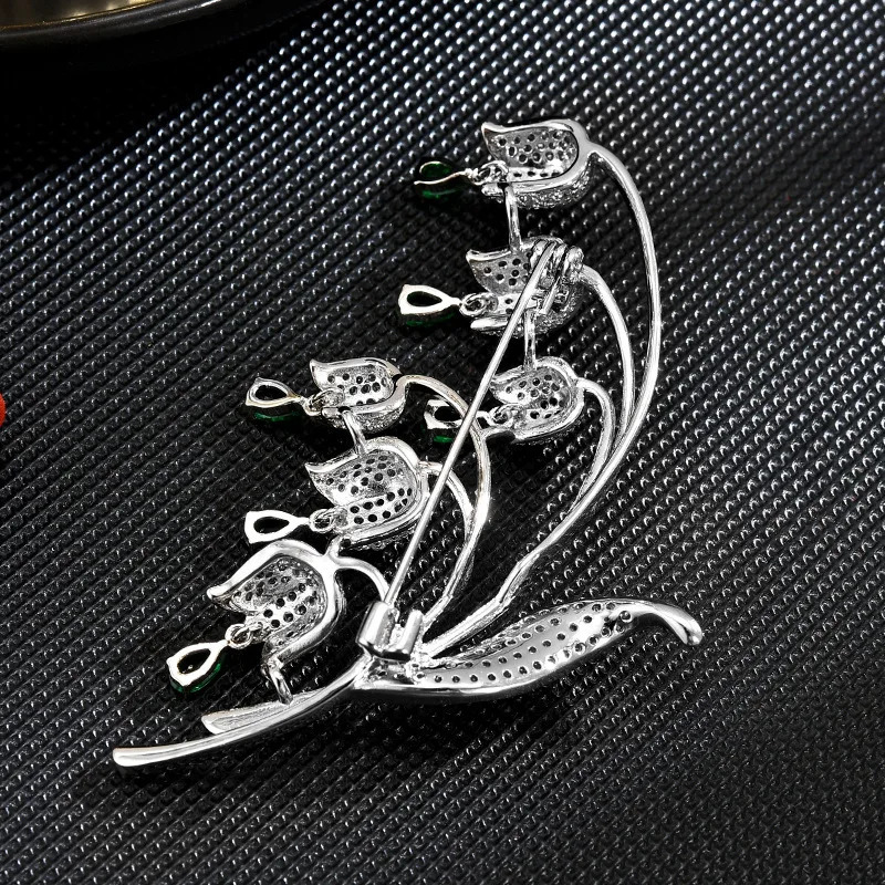 Autumn Korean Elegant and Fashionable Clock Orchid brooch Creative Personalized Flower Clothing Pin Accessories for Women 250225
