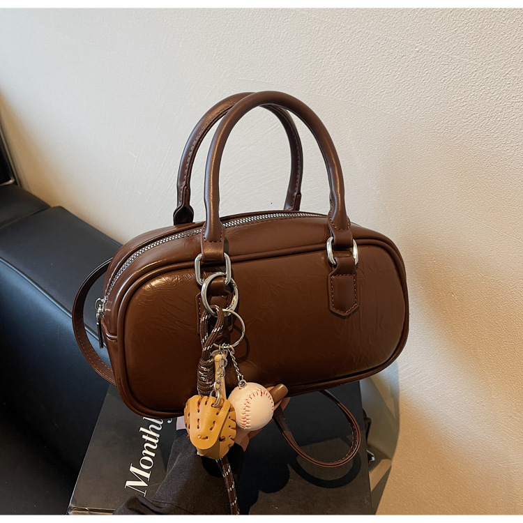 2025 new hand-held bowling for women, niche fashion, color blocking, versatile, single shoulder crossbody bag, stylish small square bag #swissmilitary