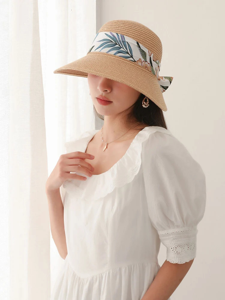 High selling womens summer tourism vacation sunshade and sunscreen hats leaf ribbon leisure beach large brim sun hat 250218