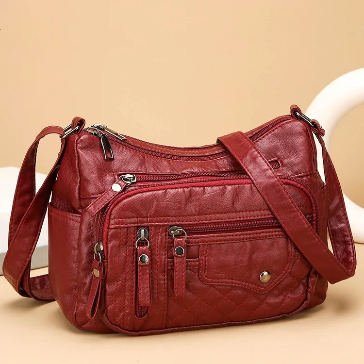 Fashion Trend Four Seasons Soft Leather Multi layer Multi pocket Car Seam Multi layer Single shoulder Crossbody Bag Womens Bag 250218