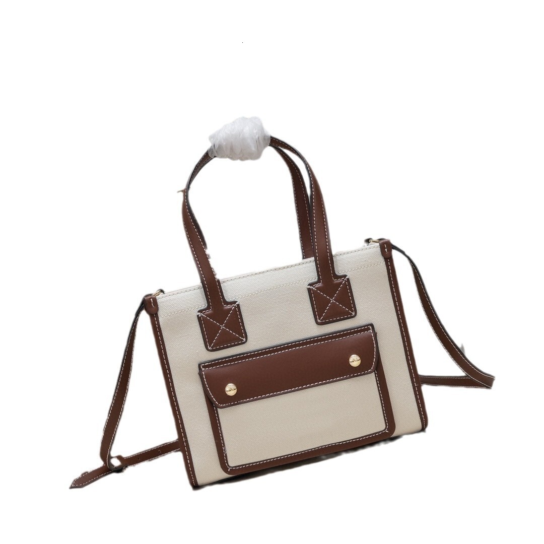 Design Aesthetics New Genuine Leather Women's Bag Design Sense Canvas Handheld Crossbody Bag European and American Style Tote Bag Niche Trendy Br