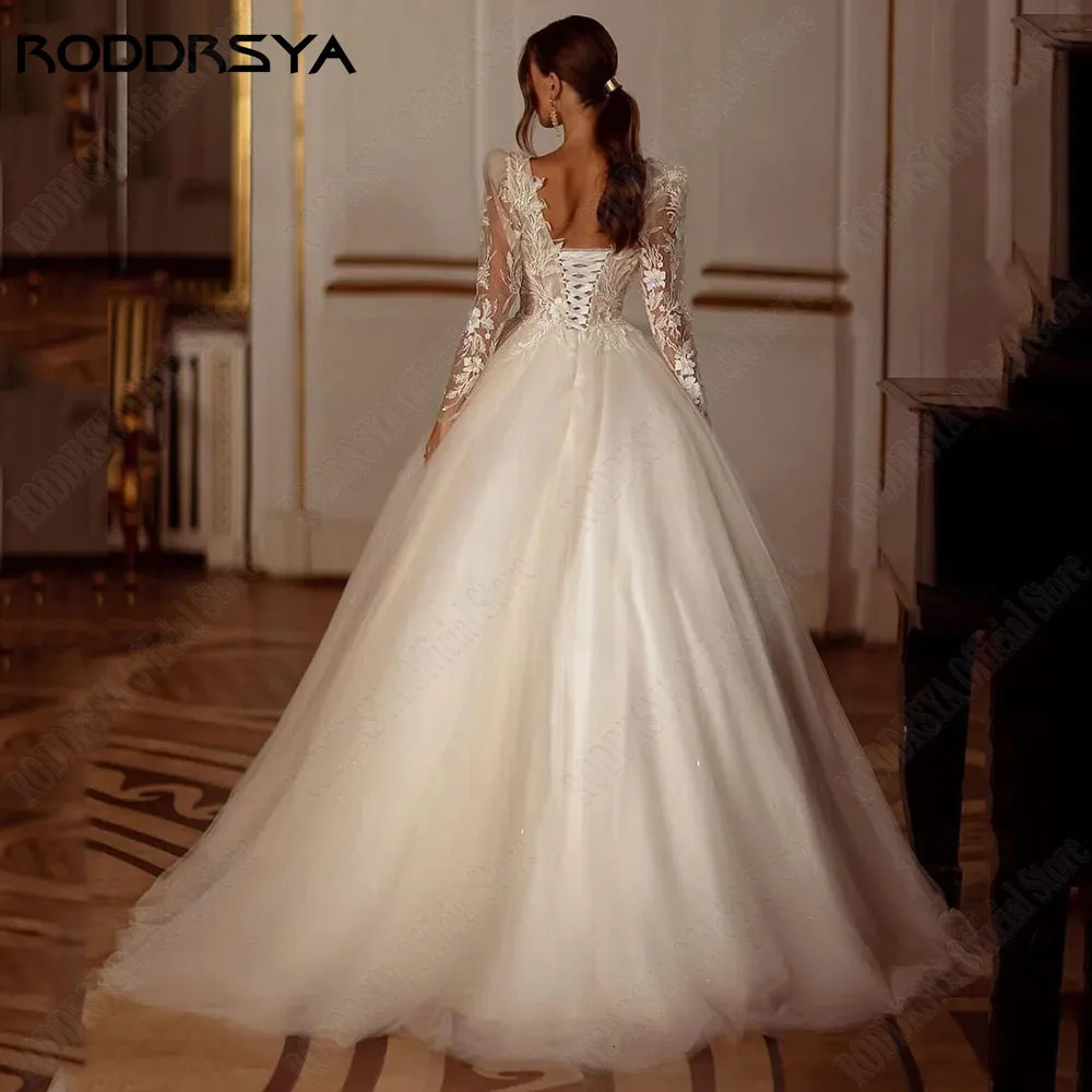 RODDRSYA Shiny Long Sleeves Wedding Dress ALine Lace Up Bridal Gowns Applique Beading VNeck Customized 250224