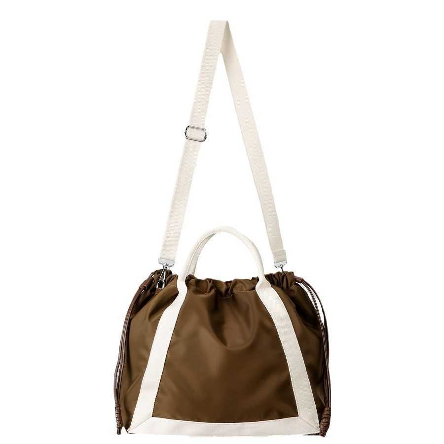 Spring multifunctional drawstring bucket bag, fashionable contrasting color drawstring fitness bag, women's nylon cloth single shoulder crossbody