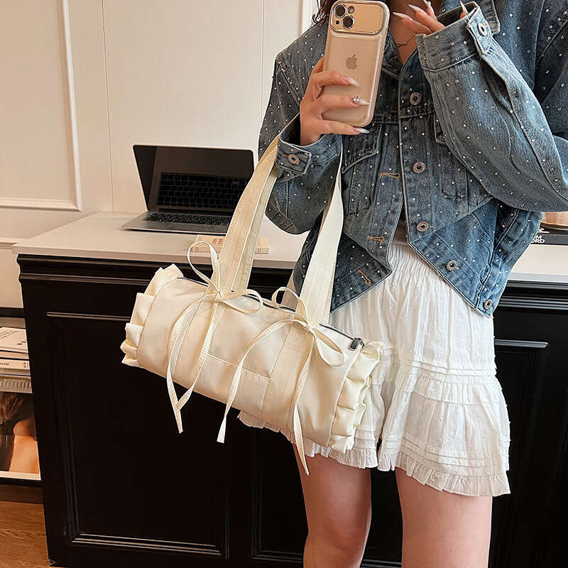 Japanese and Korean minimalist cute style large capacity casual canvas shoulder for women pleated lace commuting armpit bag 2024 temperament versatile