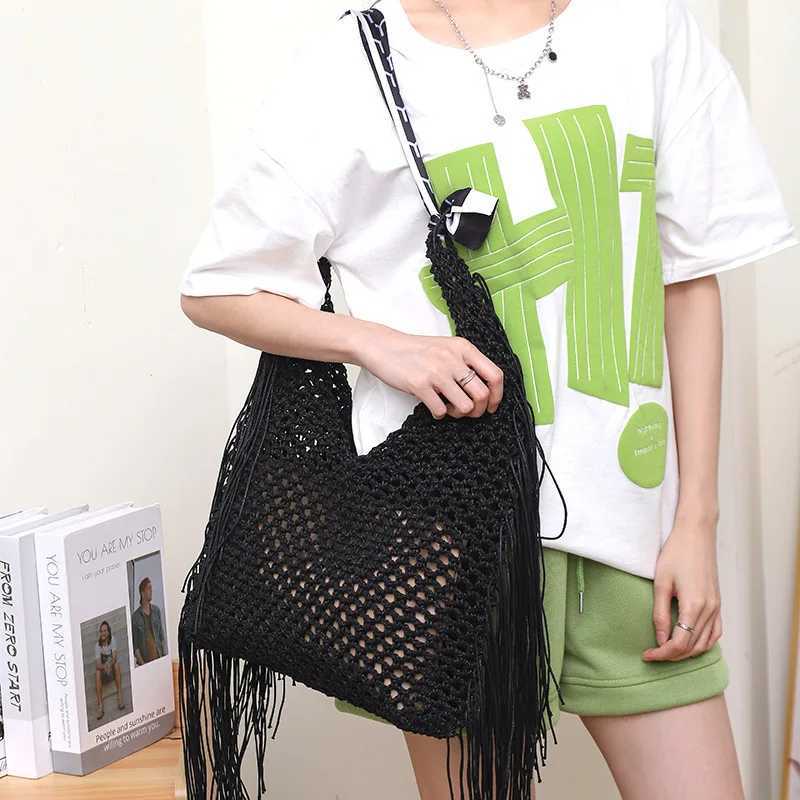 Handmade Woven Shoulder Bag with Hollowed-out Design and Tassel Pendant