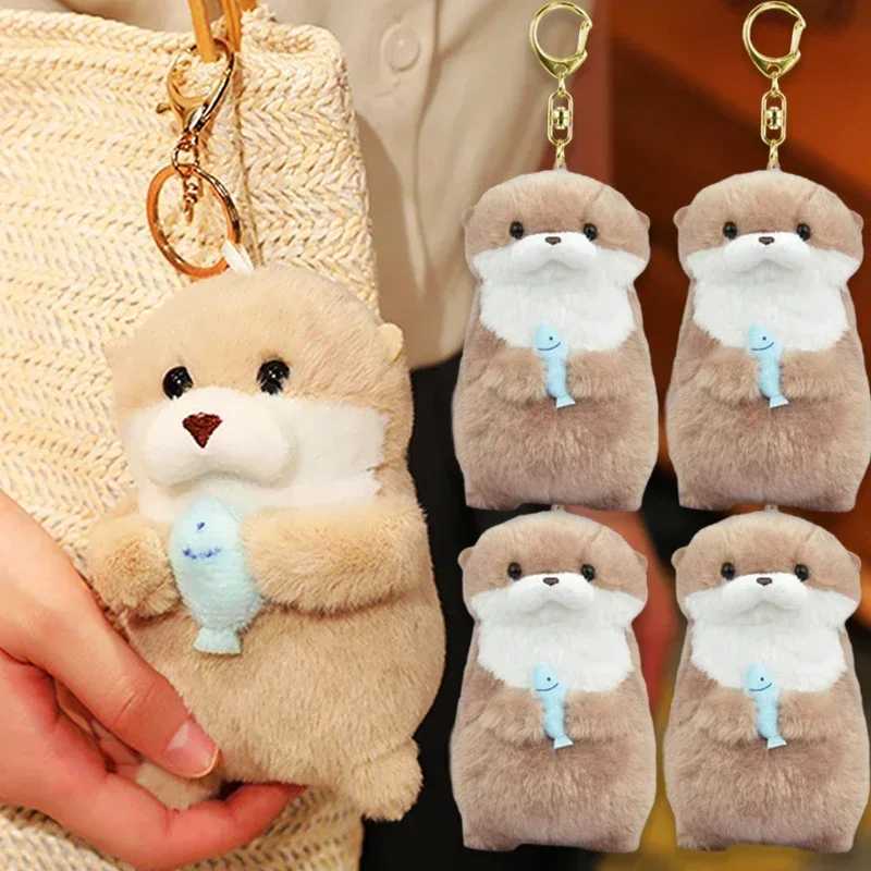 Free shipping 2024 New Cute Otter Holding Fish Plush Ring Lightweight Hanging Pendant Prop Used for School Bag Key Wallet Doll Toy Gift