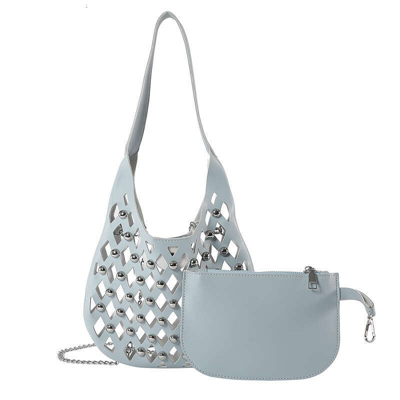 Small niche design for women hollowed out starry sky commuting armpit bag, fashionable rivet single shoulder crossbody bag 2024 new style, chic and el