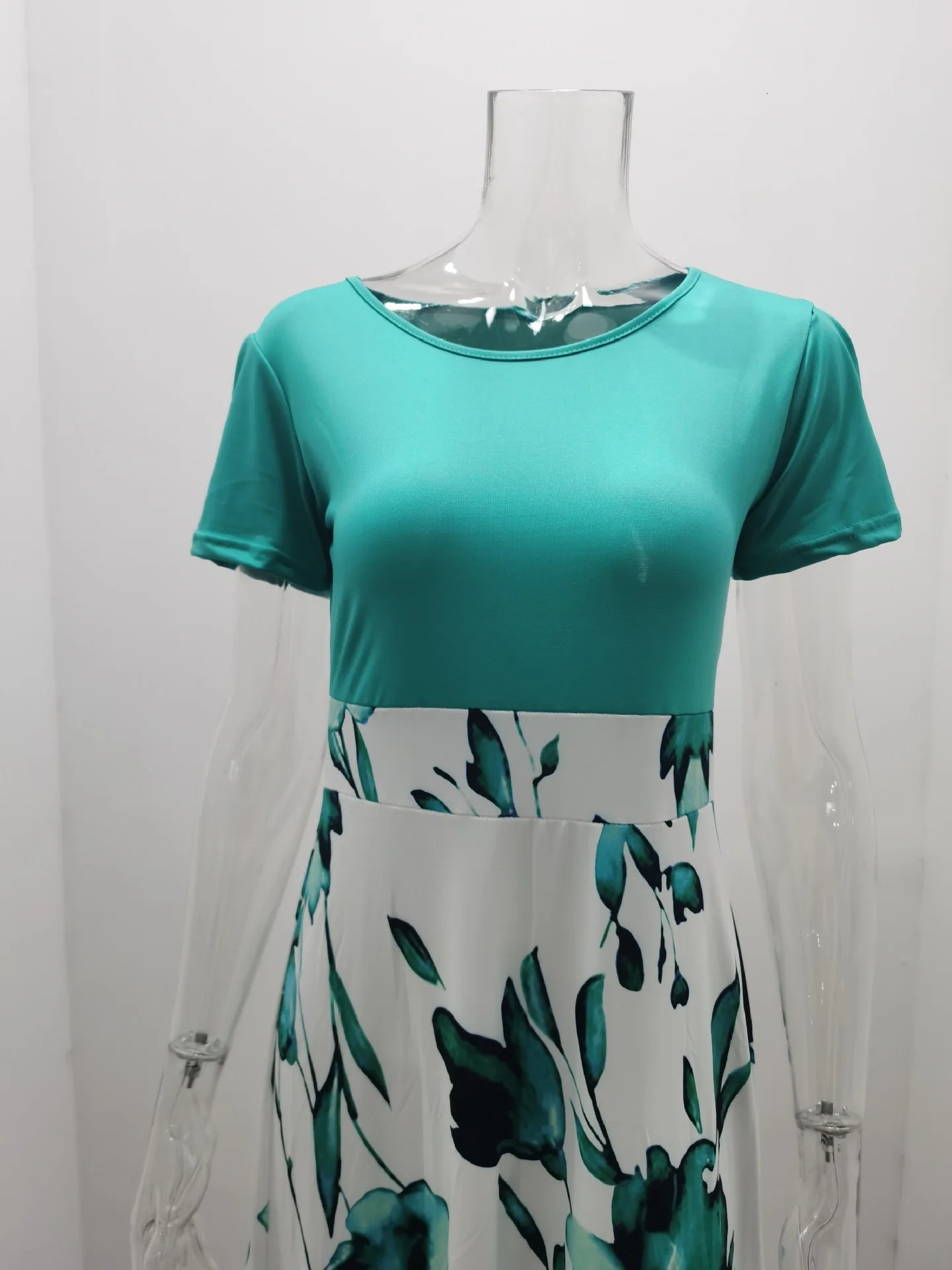 Leisure and loose fitting spring/summer fashionable flower print color blocking short sleeved womens elegant dresses 250222