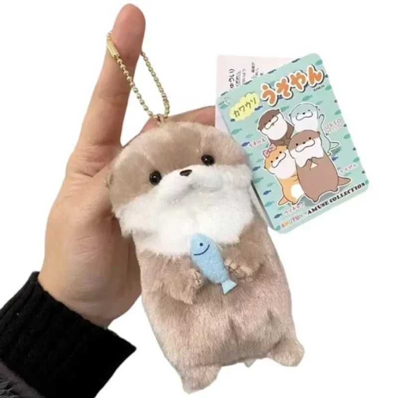 Free shipping 2024 New Cute Otter Holding Fish Plush Ring Lightweight Hanging Pendant Prop Used for School Bag Key Wallet Doll Toy Gift