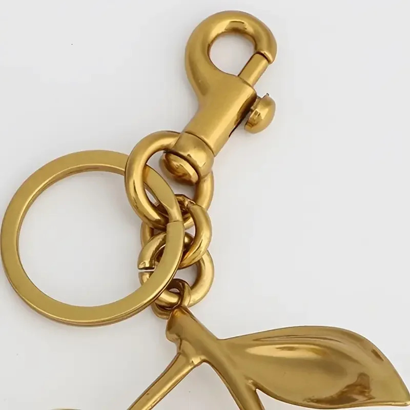 Zinc Alloy Golden Cherry Keychain for Women and Men Fashionable Glitter Keyring Summer Fruit Pendant Jewelry Bag Accessory 1Pc 250227