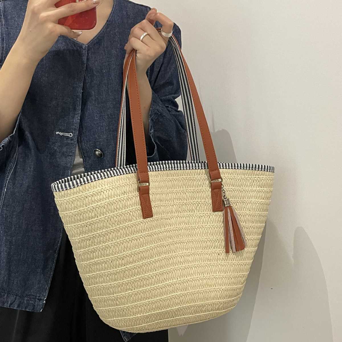 Relaxing large capacity woven bag for women in spring 2025, fashionable and versatile vacation beach bag, hand-held vegetable basket bag