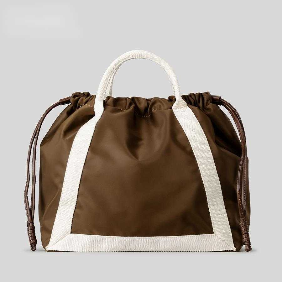 Spring multifunctional drawstring bucket bag, fashionable contrasting color drawstring fitness bag, women's nylon cloth single shoulder crossbody