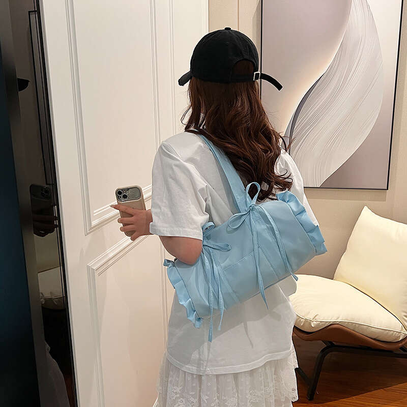 Japanese and Korean minimalist cute style large capacity casual canvas shoulder for women pleated lace commuting armpit bag 2024 temperament versatile