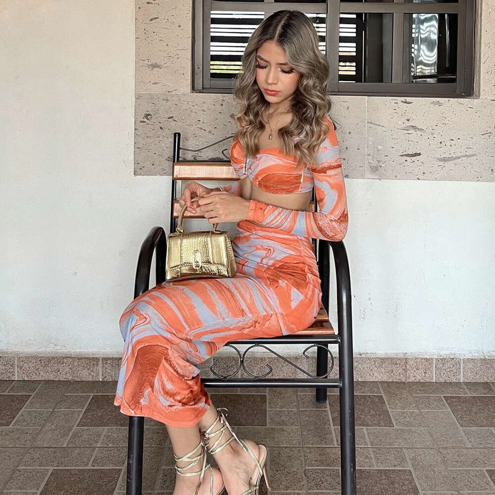New women's spring and summer sexy mesh printed long sleeved top slim fit skirt set 2025 new casual versatile fashion clothing