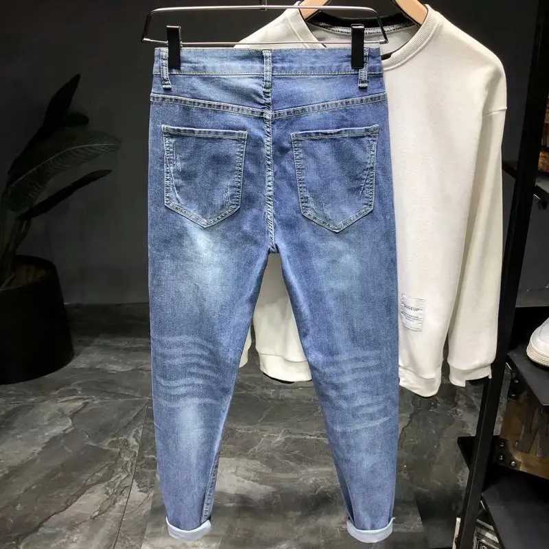 Fashion Luxury Brand Wash Stylish Mens Designer Blue Denim Boyfriend Slim with Ripped Hem and Distressed Broken Jeans X250227