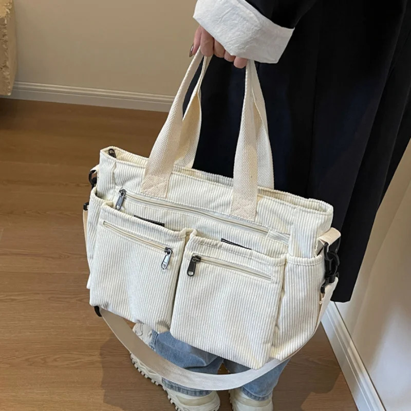 Womens highcapacity Corduroy handbag Korean fashion womens shoulder cross body work bag commuting handbag handbag 250218