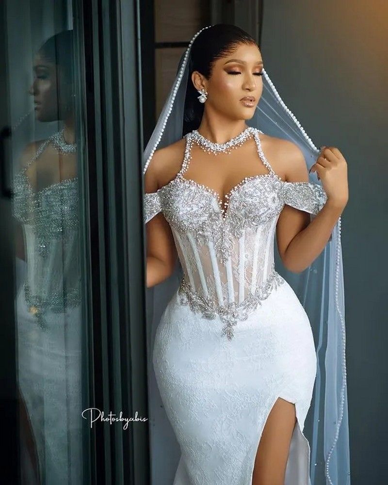 2025 Arabic Aso Ebi Mermaid Wedding Dress Detachable Train Off the Shoulder Lace Beaded Sequined Crystal Bridal Bride Gowns Vestidos De Novia
