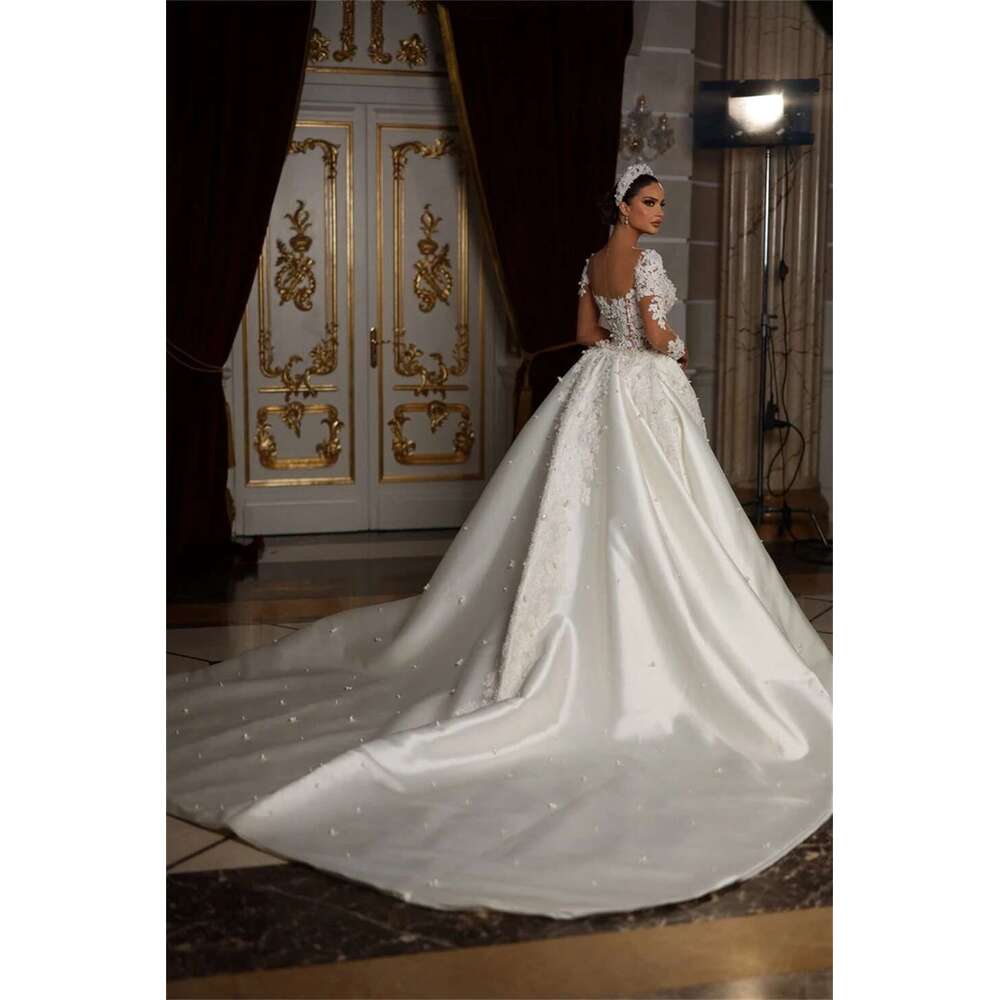 of the Mermaid Wedding Dress with V Neckline Bareback Long Sleeves Appliques Beads Backless Satin Chapel Custom Dresses from novia
