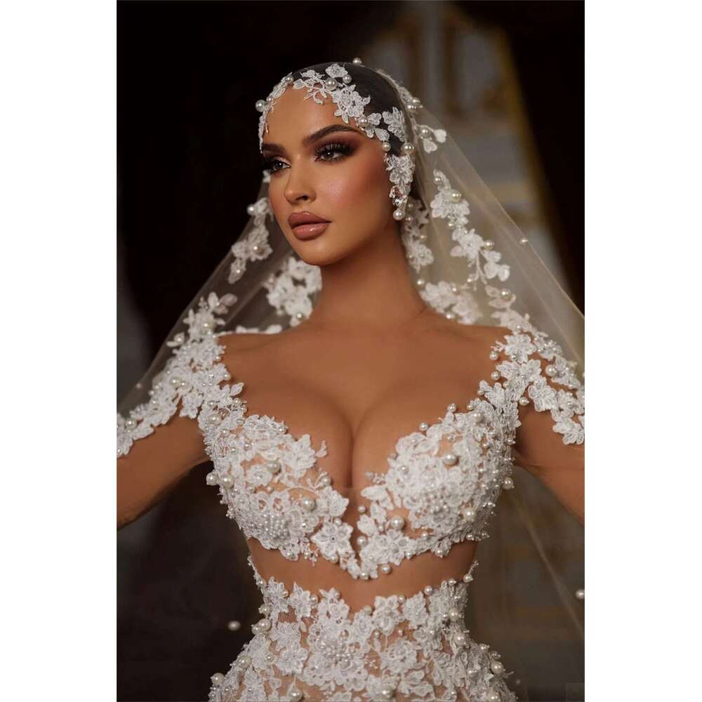 of the Mermaid Wedding Dress with V Neckline Bareback Long Sleeves Appliques Beads Backless Satin Chapel Custom Dresses from novia