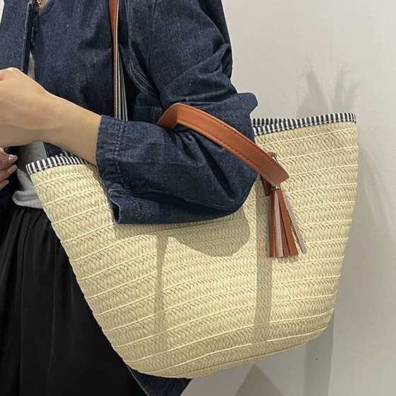 Relaxing large capacity woven bag for women in spring 2025, fashionable and versatile vacation beach bag, hand-held vegetable basket bag