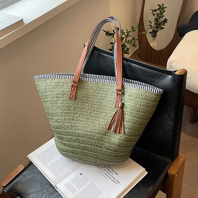 Relaxing large capacity woven bag for women in spring 2025, fashionable and versatile vacation beach bag, hand-held vegetable basket bag