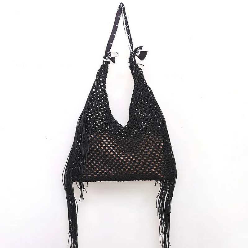 Handmade Woven Shoulder Bag with Hollowed-out Design and Tassel Pendant