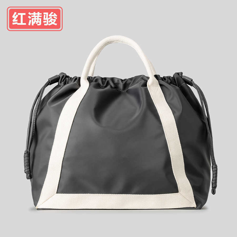 Spring multifunctional drawstring bucket bag, fashionable contrasting color drawstring fitness bag, women's nylon cloth single shoulder crossbody