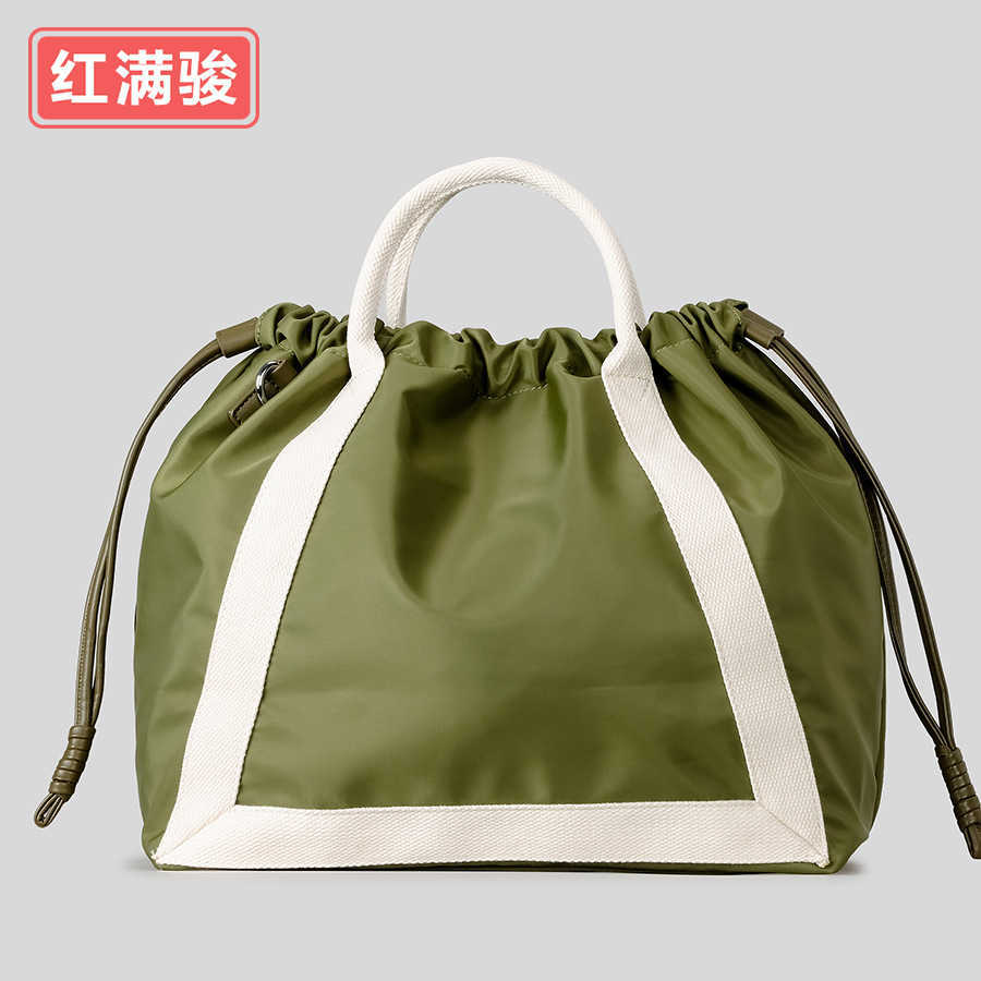 Spring multifunctional drawstring bucket bag, fashionable contrasting color drawstring fitness bag, women's nylon cloth single shoulder crossbody