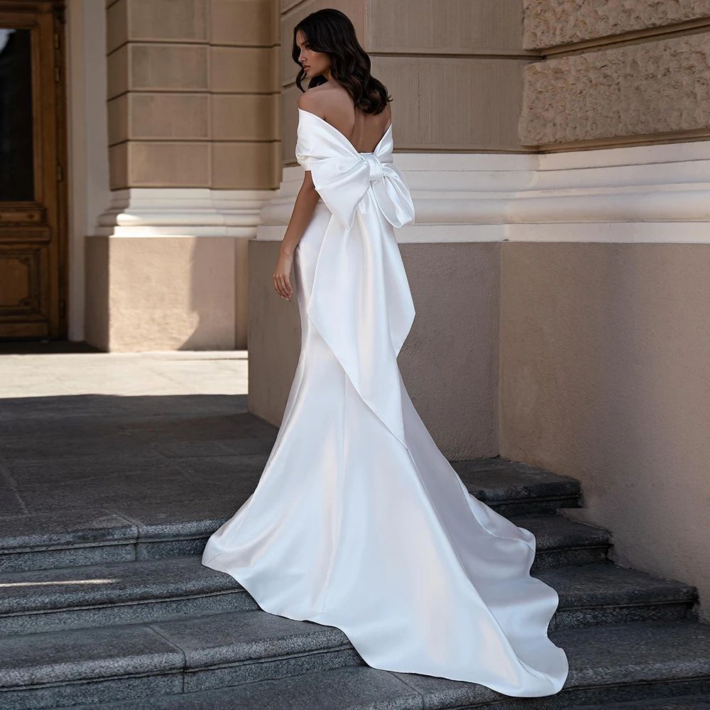 2025 New Arrival Satin Mermaid Wedding Dress Sexy Off the Shoulder Sleeveless Back Big Bow Sweep Train Bridal Gown Vestidos De Novia