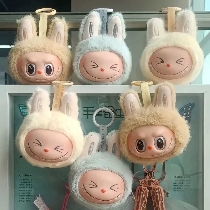 New hot selling anime Labubu in 2024 sitting on the second-generation small head model cute monster replicated keychain toy birthday gift Free shippin