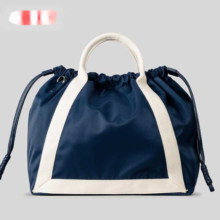 Spring multifunctional drawstring bucket bag, fashionable contrasting color drawstring fitness bag, women's nylon cloth single shoulder crossbody