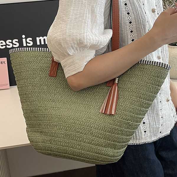 Relaxing large capacity woven bag for women in spring 2025, fashionable and versatile vacation beach bag, hand-held vegetable basket bag