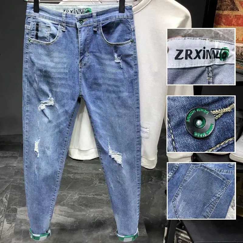 Fashion Luxury Brand Wash Stylish Mens Designer Blue Denim Boyfriend Slim with Ripped Hem and Distressed Broken Jeans X250227
