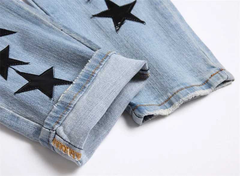 Mens high street new ripped stars patch jeans mens fashion slim feet full of stars stretch jeans male trend X250227